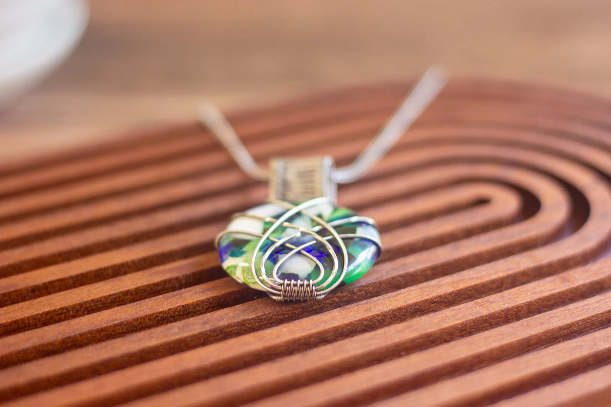 Crisscross Sterling Silver Pendant with Green, Blue White Fused Glass Cabochon