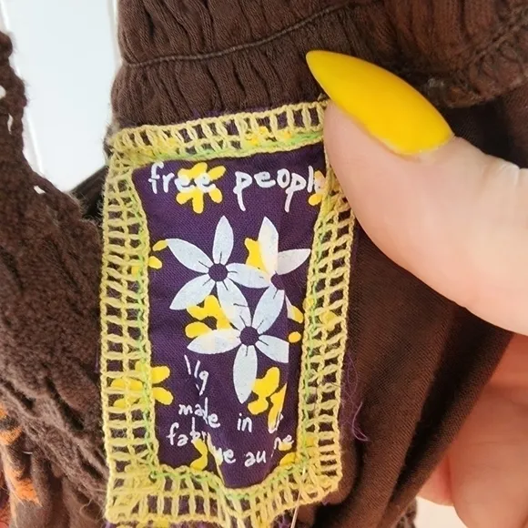 Free People espresso cotton criss cross straps w/ paisley print.