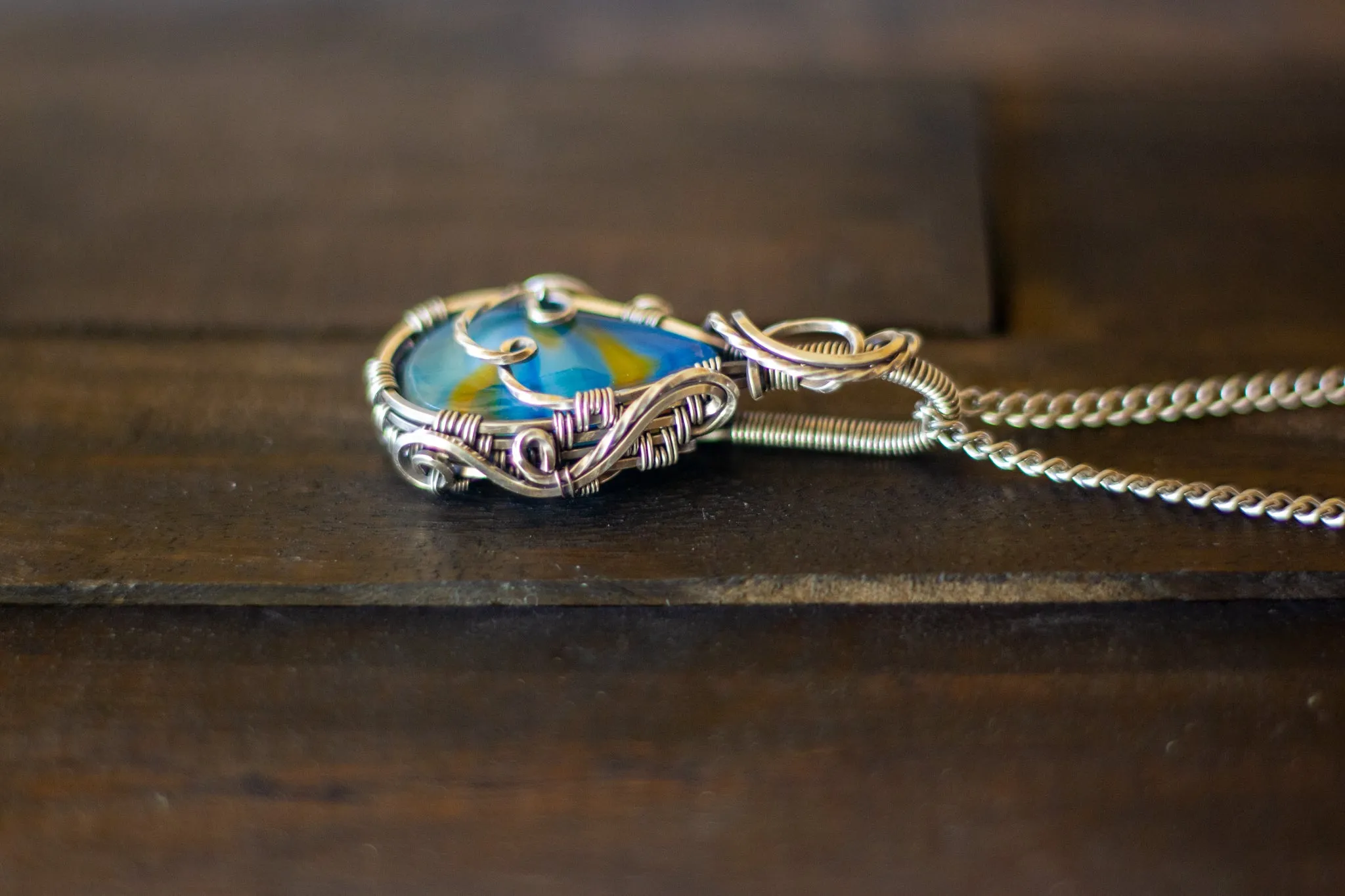 Sterling Silver Teardrop Pendant with Blue and Orange Fused Glass