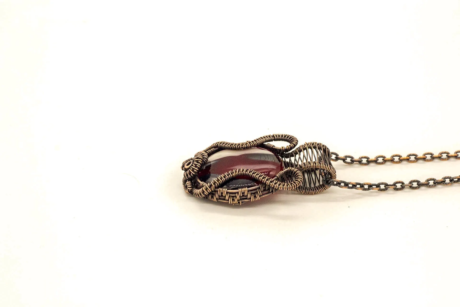Streaked Red, Black, and White Fused Glass Pendant with Copper Wire Wrapping