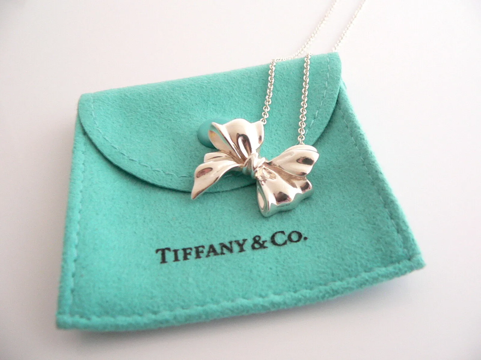 Tiffany & Co  Silver Large Ribbon Bow Necklace Pendant 19 inch Chain Gift Pouch