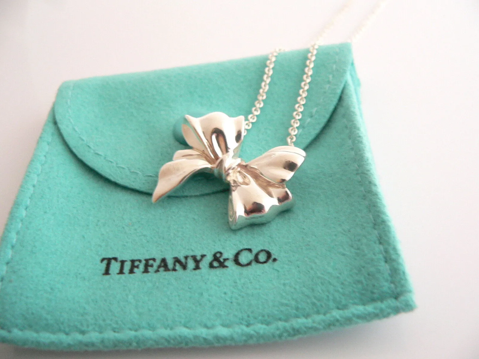 Tiffany & Co  Silver Large Ribbon Bow Necklace Pendant 19 inch Chain Gift Pouch