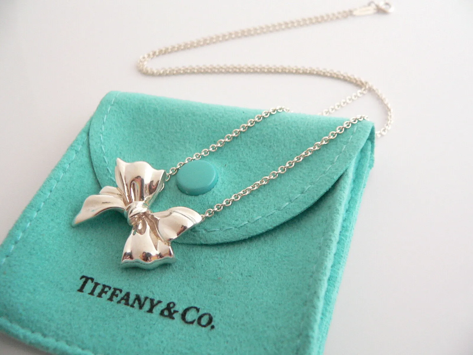 Tiffany & Co  Silver Large Ribbon Bow Necklace Pendant 19 inch Chain Gift Pouch