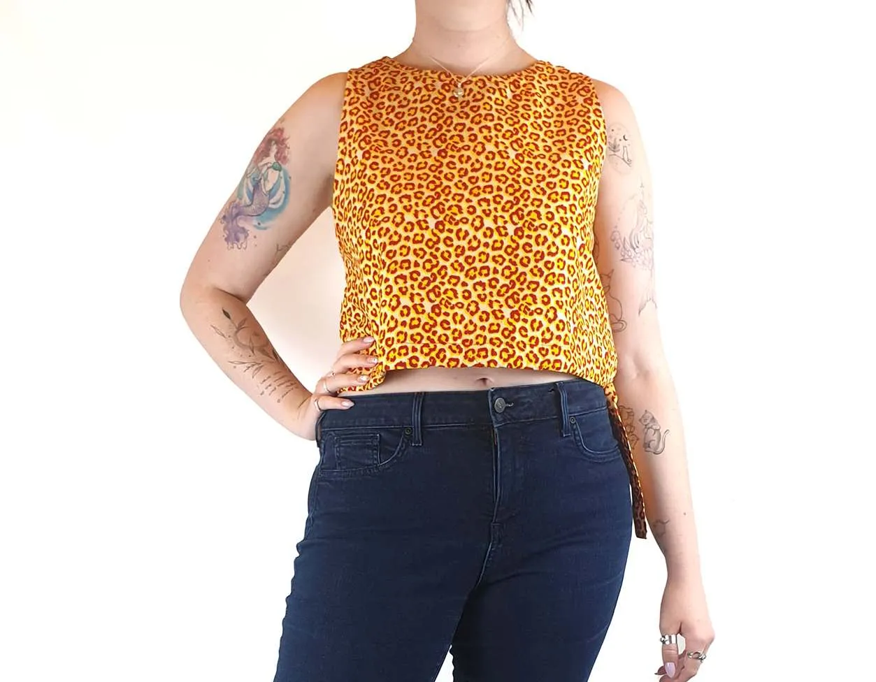 Yevu yellow and orange animal print cropped sleeveless top size M (best fits 12)