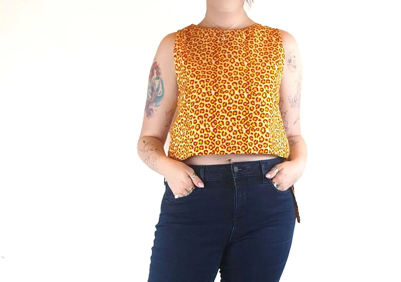 Yevu yellow and orange animal print cropped sleeveless top size M (best fits 12)