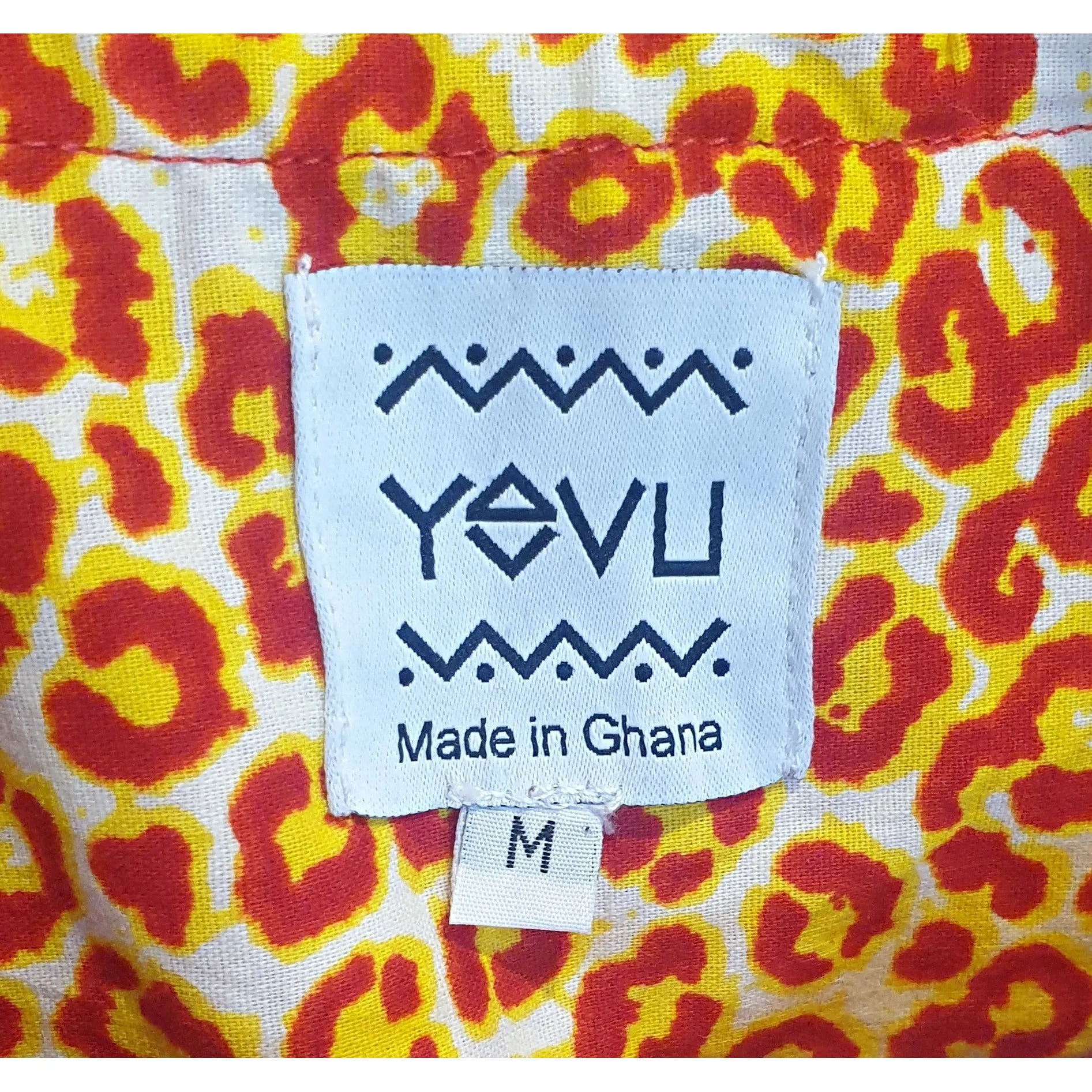 Yevu yellow and orange animal print cropped sleeveless top size M (best fits 12)