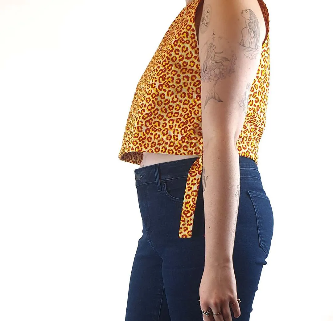 Yevu yellow and orange animal print cropped sleeveless top size M (best fits 12)