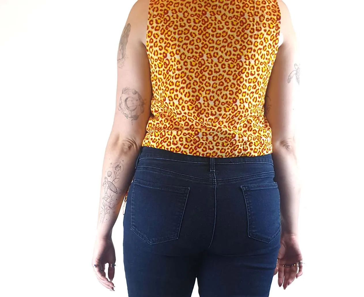 Yevu yellow and orange animal print cropped sleeveless top size M (best fits 12)