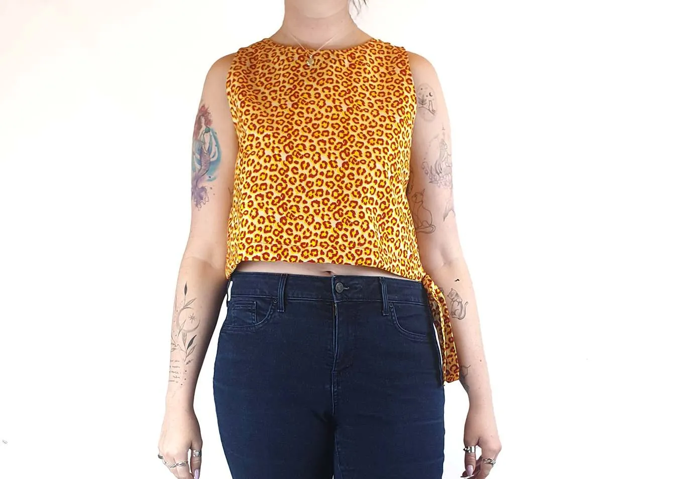 Yevu yellow and orange animal print cropped sleeveless top size M (best fits 12)