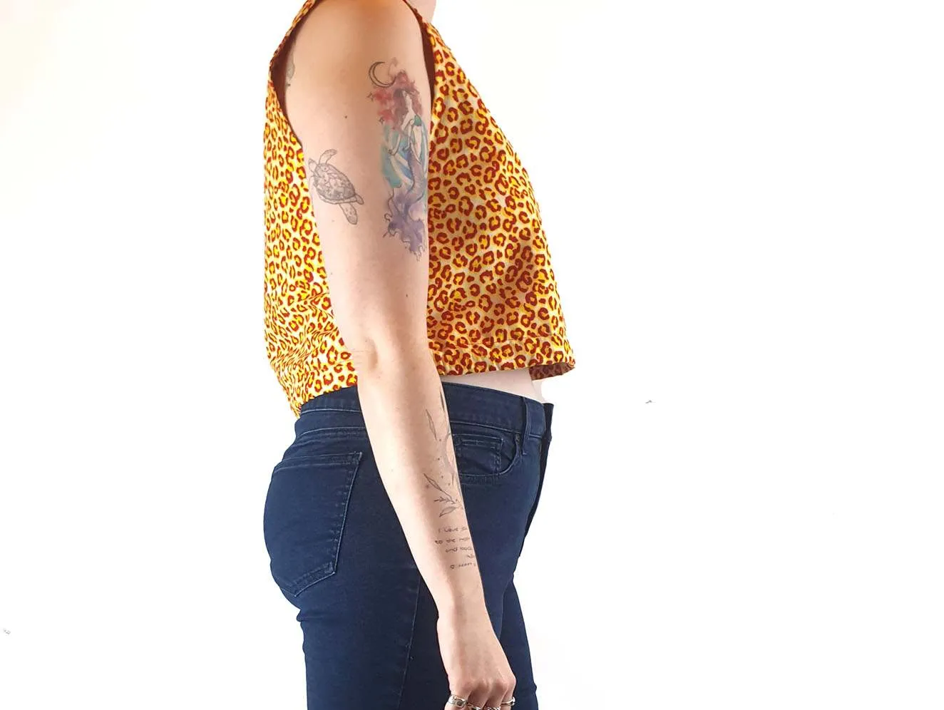 Yevu yellow and orange animal print cropped sleeveless top size M (best fits 12)